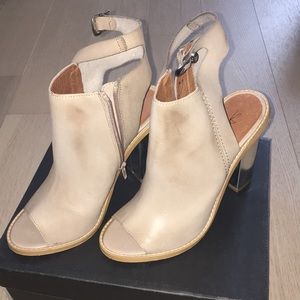 Nude open toed booties with silver block heel